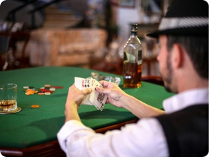 casino table with man playing poker
